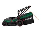 Green electric lawnmower with a black grass collection bag and an orange power cord.