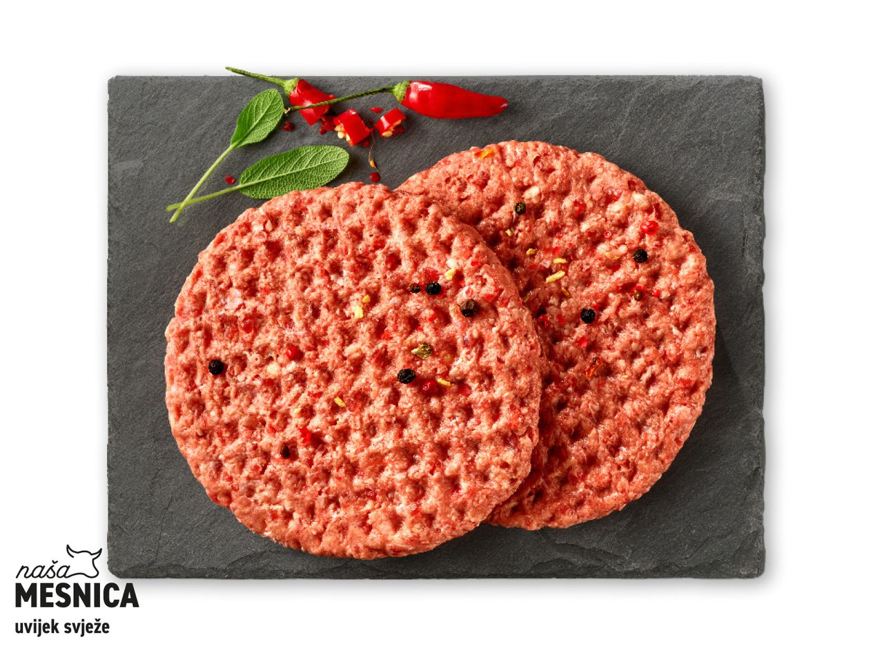 Dvije Mesnica biljne pljeskavice na tamnoj podlozi.