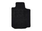 Black car floor mat with textured design.