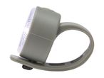 Grey bicycle light with a flexible strap, illuminated from the front.