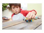 A boy playing with toy cars on a wooden table, with text 'EACH SOLD SEPARATELY. SUBJECT TO AVAILABILITY'.