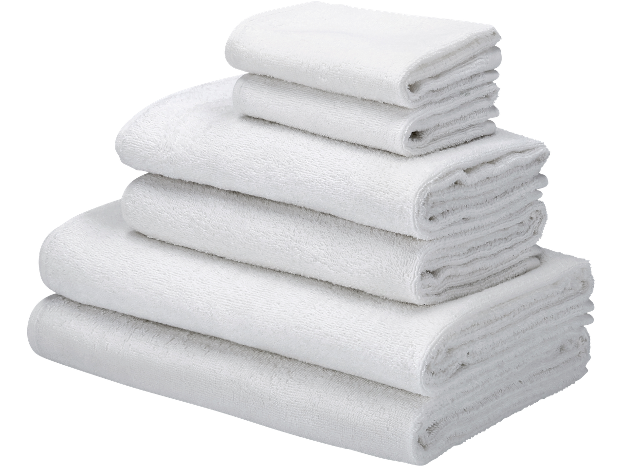 Stapel weißer Handtücher.