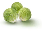 Three fresh Farrell's Irish Brussels Sprouts on a white background.