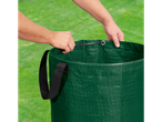 Hands opening a dark green garden bag.