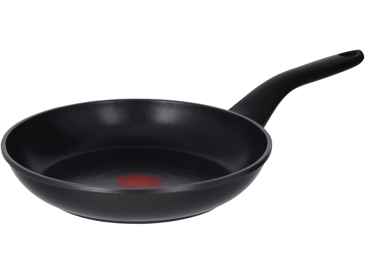 Black frying pan with a red heat indicator in the center, angled view.