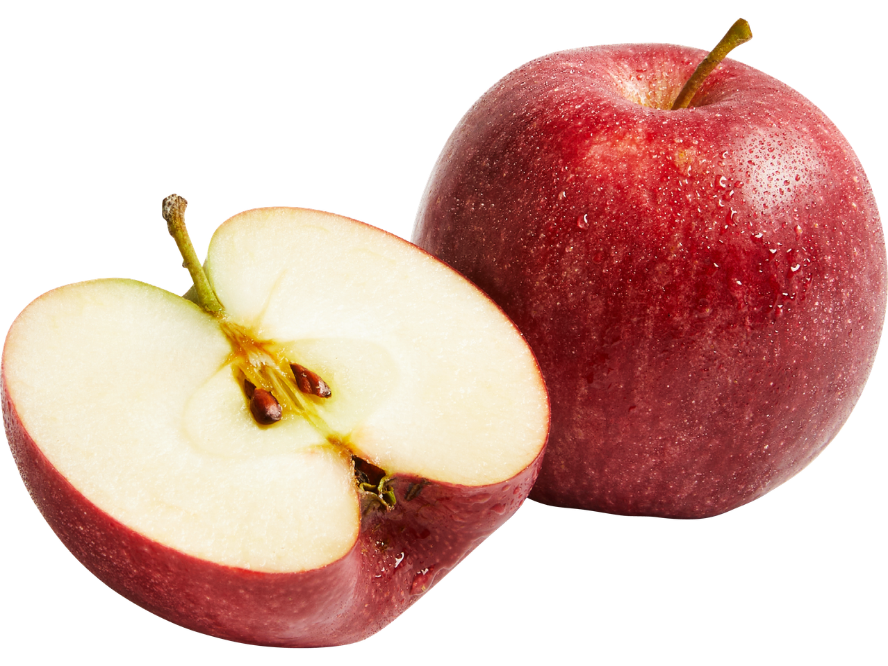 Ett rött äpple och ett halvt äpple med synliga kärnor.