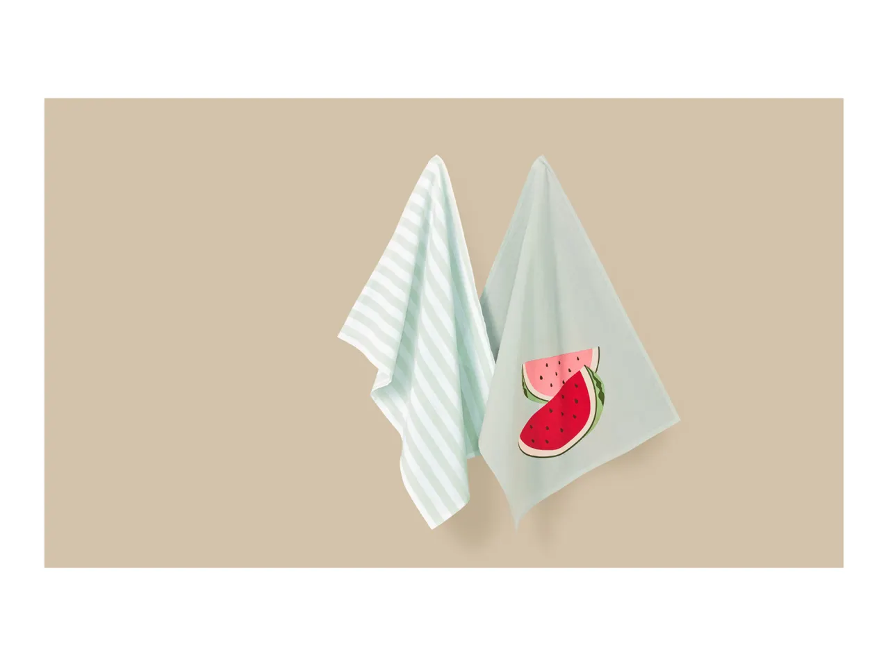 Two kitchen towels, one striped light green and white, one light green with watermelon slices.