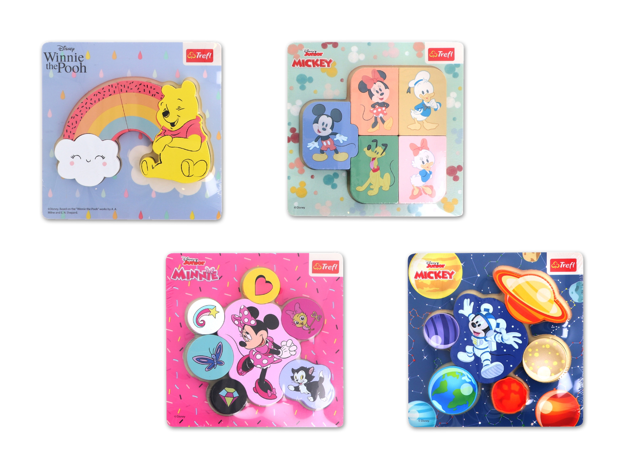 Vier Trefl-Holzpuzzles mit Disney-Junior-Motiven: Winnie Puuh, Mickey Maus, Minnie Maus und Mickey Maus im Weltraum.