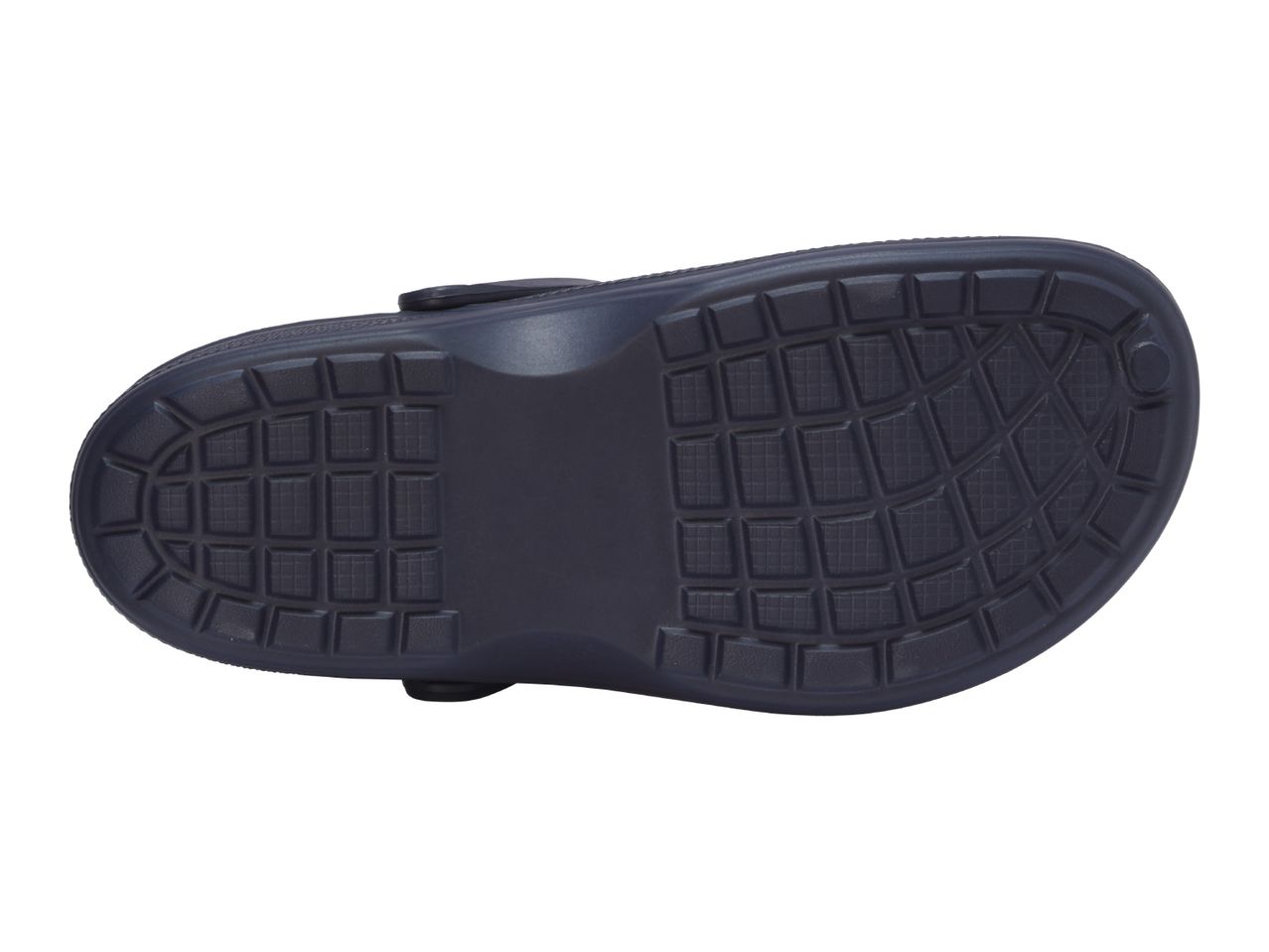 Bottom view of a dark blue children's clog with a textured sole.