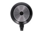 Bottom view of a black frying pan with a silver-colored induction base and a black handle.