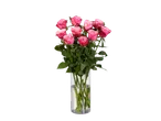 Buquê de rosas cor-de-rosa em um vaso de vidro sobre fundo preto.