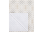 Beige and blue geometric patterned tablecloth, partially folded.