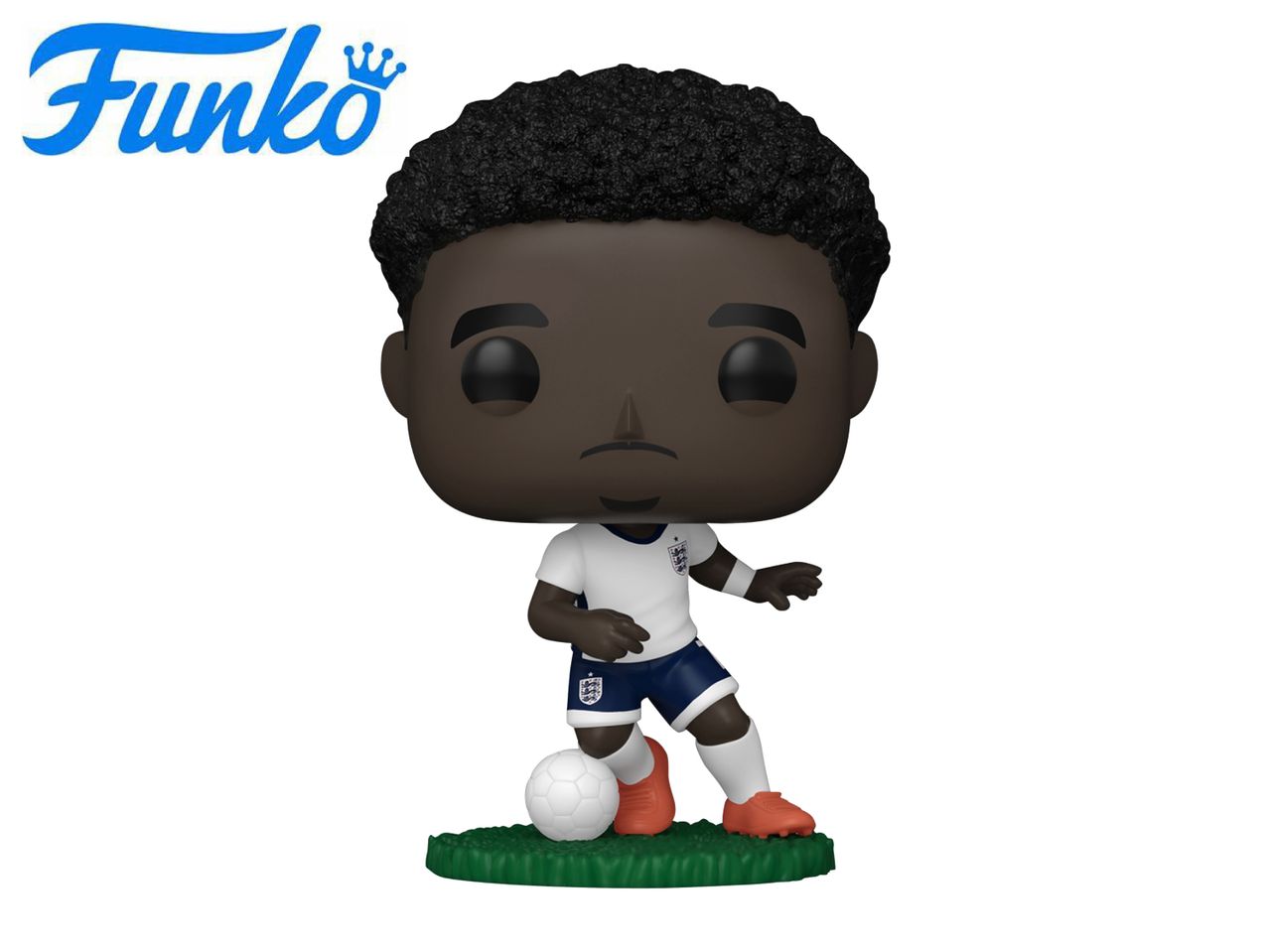 Football player figurine in white and blue uniform, with a soccer ball on a green base.