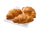 Drie goudbruine kaascroissants op een wit servet.