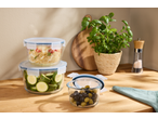 SILVERCREST® Glass Food Storage Containers with couscous, zucchini, and olives on a wooden counter.