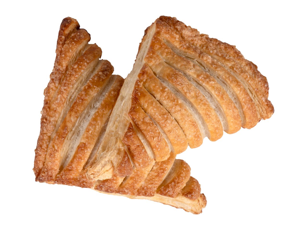 Două produse de patiserie cu zahăr, aurii, cu dungi, pe un fundal alb.