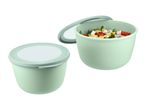 Two light green food containers, one closed and one open with a pasta salad inside.