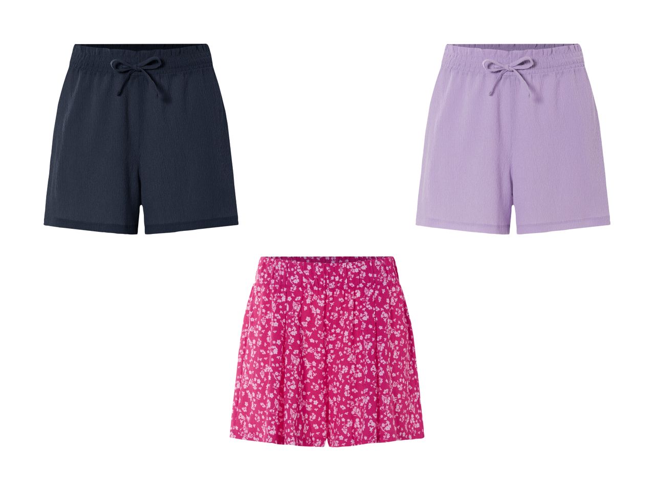 Drei Damen-Shorts: dunkelblau, lila und rosa mit Muster.