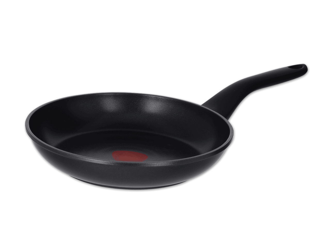 Schwarze Tefal Pfanne mit rotem Thermo-Spot auf schwarzem Hintergrund.