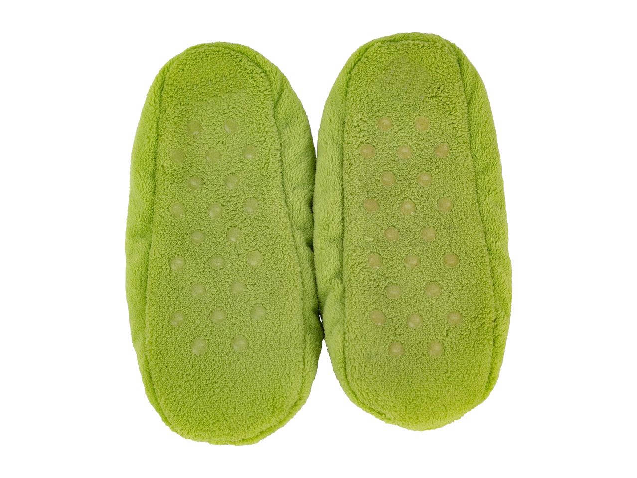 Pair of green baby slippers with non-slip soles, viewed from the bottom.