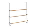 Over-the-door towel rack with three bamboo bars and white metal frame.