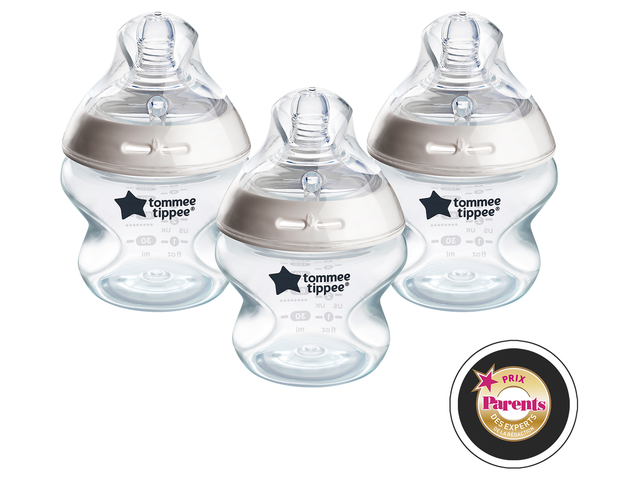 Three baby bottles with clear bodies and white tops, one with a 'Parents' award sticker.