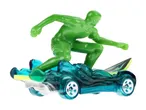 Green surfer toy figure on a blue surfboard car, isolated on a white background.