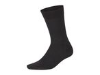 A single black sock standing upright on a white background.
