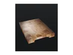 Thick wooden end-grain cutting board with built-in side handles on a dark background.