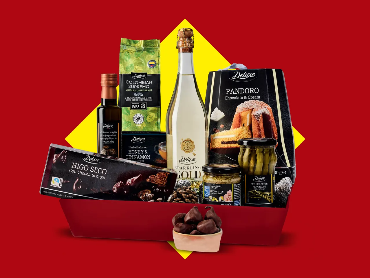 Coș cadou Deluxe cu cafea, șampanie, panettone, ulei de trufe, smochine, ceai, pesto și sparanghel.