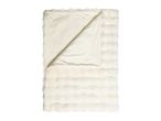 Soft cream-colored faux fur blanket with a plush, textured design