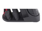 Close-up of a black, three-slot knife sharpener.