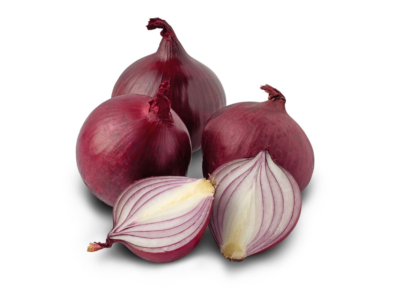 Three whole red onions and two halves of a red onion, showing the white and purple layers.