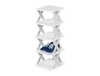 White four-tier shoe rack with a pair of blue sneakers on the third shelf.
