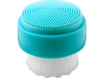 Escova de limpeza facial de silicone turquesa.