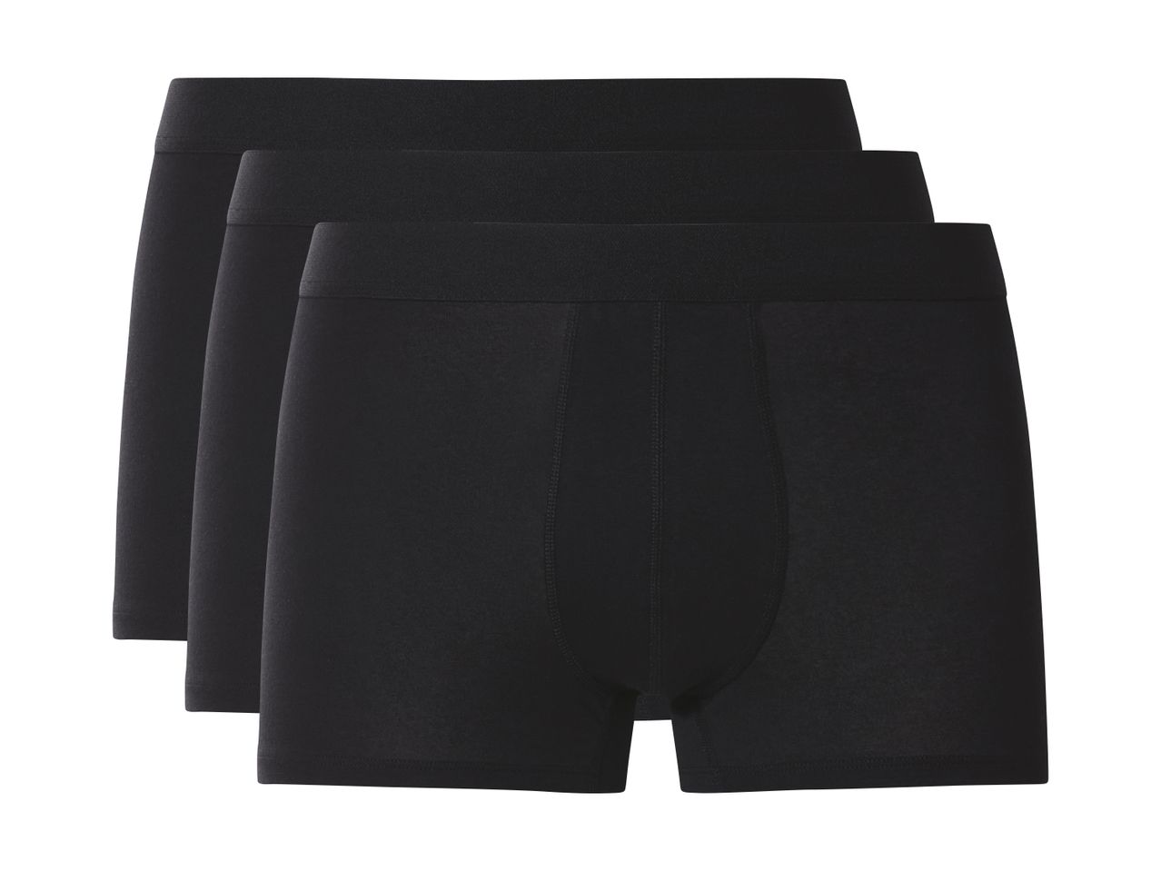Tre sorte herreboxershorts med elastik i taljen, stablet oven på hinanden.