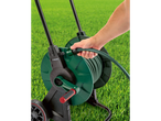 Parkside hose reel with hose on lawn.