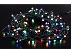 Multicolor LED string lights, coiled on a dark surface, glowing brightly.
