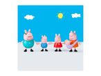 A family of pig figurines, including a father, two children, and a mother holding a baby, against a blue sky with clouds and a sun.
