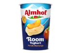 Een beker romige yoghurt met de smaak perzik en maracuja.