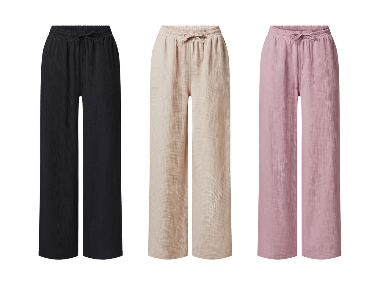 Drei weite Hosen aus Waffelstoff in Schwarz, Beige und Rosa.