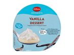 Milbona vanilla dessert topped with whipped cream.