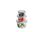 Stack of SILVERCREST® Glass Food Storage Containers with blueberries, tomatoes, and salad.