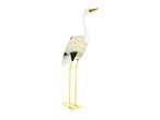 White crane garden decoration with yellow legs.
