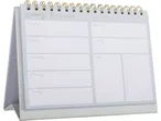 Un calendario da tavolo bianco con spazio per le note.