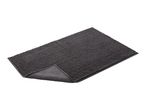 A dark gray bath mat with a textured surface is shown at a slight angle.