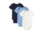 Three short-sleeved baby bodysuits in navy, light blue, and white, arranged diagonally.