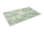 Grün-weiß gemusterter Teppich mit Palmenblatt-Design
