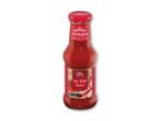 Varm chilisauce i kinesisk stil med mærkning for mild, medium og stærk.