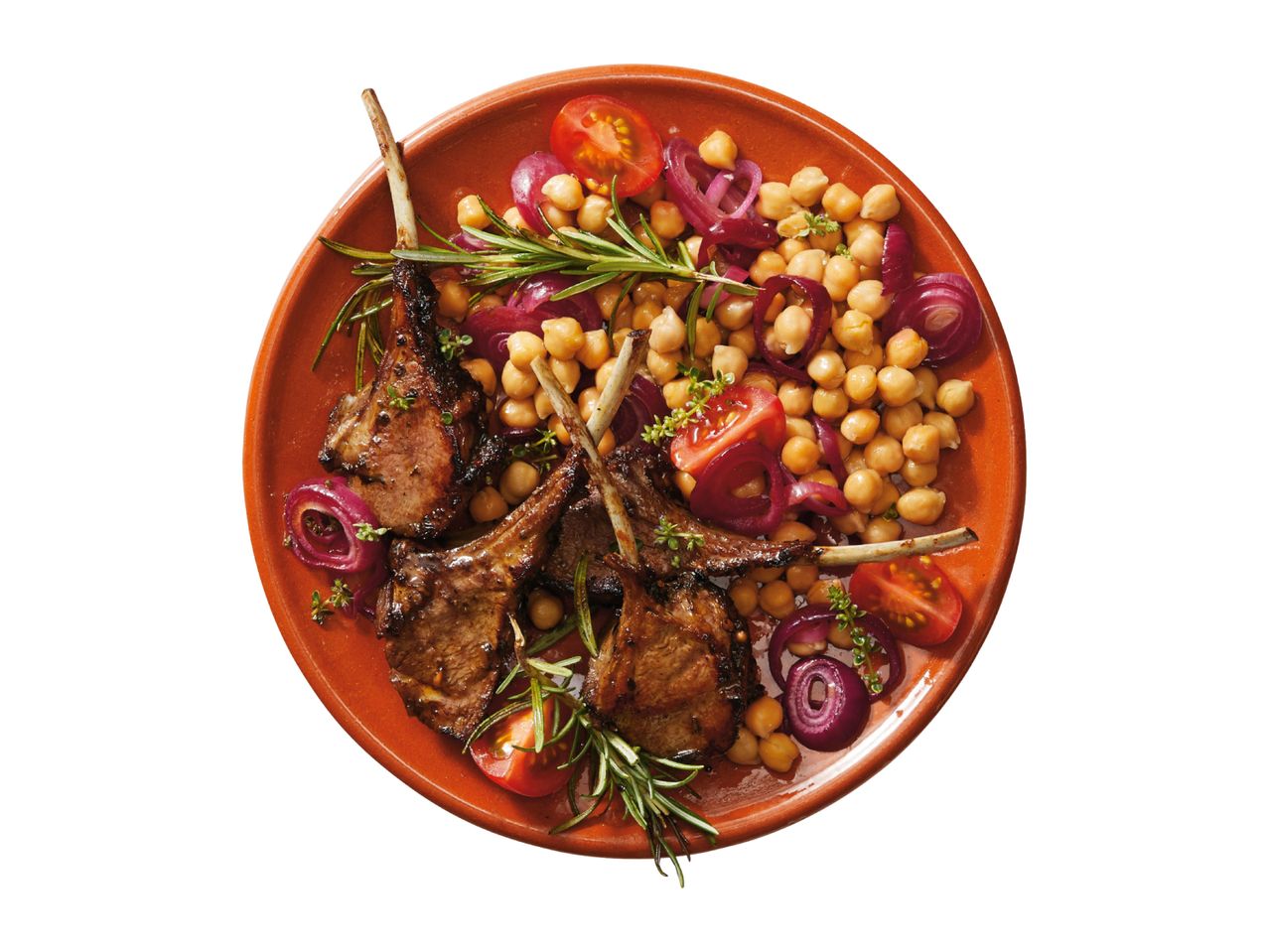 Grilled lamb chops with chickpeas, red onion, cherry tomatoes, and rosemary on a terracotta plate.